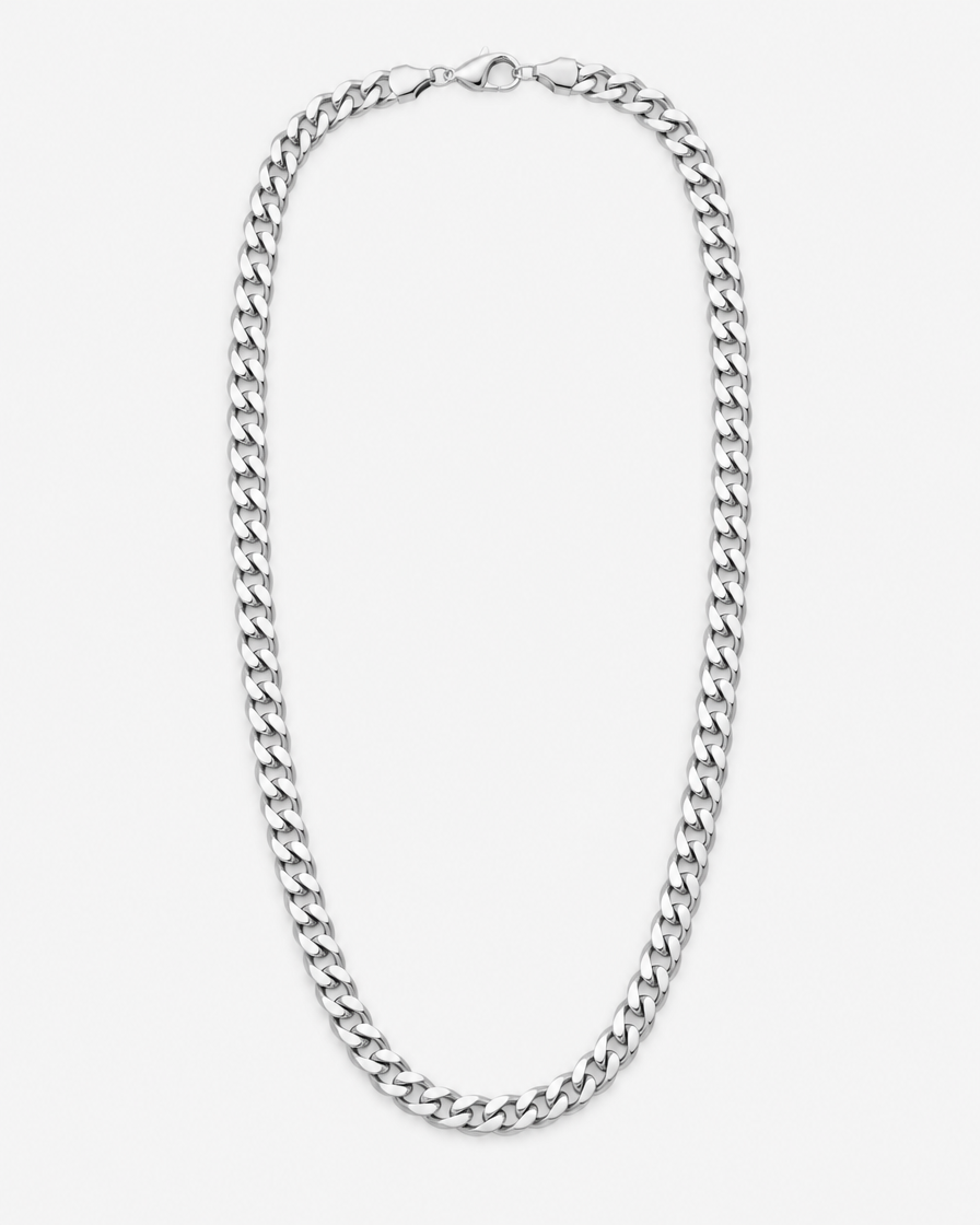 Plain polished silver-tone Cuban link chain on an off-white background
